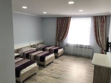 Фото номера Трехместный номер с ванной комнатой Гостевой дом Saty Guest House г. Saty 6